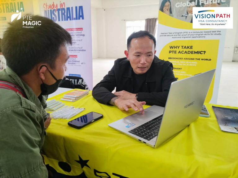 Our PTE Trainer Rey speaking to a student interested
